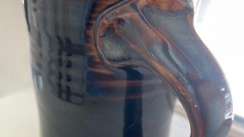 close up of mug with high-iron glaze